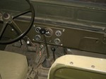 notice the MB dash with MB style glove-box, no hand brake at all on the M38 1980s era Acme body. A M38 gauge panel had been put over the MB cut-outs 