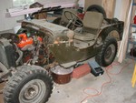 The body that is now Rick L's jeep.  I bought just the body, frame, and running grear.  Body did not have a cowl but came with a rusted tub that did.  The cowl on it in this pic was a WW2 Cowl.