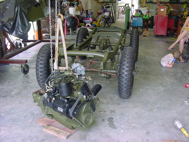 Getting Ready to install Engine and transmission. May 9, 2006.
Tie rod assembly unpainted & temporarily installed.  
Don't pay any attention to the pair of legs on the right!!

