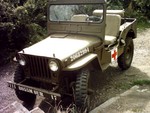Most of the Vets spoke highly of the 8055th Surgical Unit and the 42 EVAC. Both of which looked after the Commonwealth Brig. and the Belgies and Dutch. And having met an ex. Dutch Medic veteran I painted the jeep in those colours. Can you work out the name??