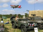 Fiona (My wife)at Branscombe Air day with our M606A1 , yes- that is the runway, a Mustang also landed just behind the jeeps! See you tube http://www.youtube.com/watch?v=pLZqQAUr1Es July 2004