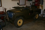 My M38A1 in the garage, freshly delivered by my dad in October 09.