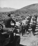US Air Force Survival school escape training, Forced march of prisoners beginning after enemy patrol captured them just before end of long trek.1955