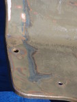 Top side of transmission cover showing blue paint