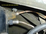 Elbow on air cleaner for wiper vent line.
