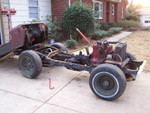 Rolling, greasy, busted, rusted chassis.