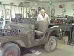 This is my Dad and the day he got the jeep home .