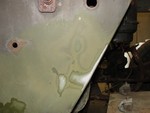 Right of tub below windshield, just green