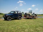 Both of my Jeeps.  On the way to the DMV for title inspection.  