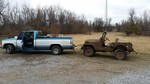 Towing the jeep to its new home.