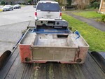 Rough tub.  Note welded holes above tail light holes.  Has arctic top reinforcements.  Late style tub with incorrect toolbox installed.