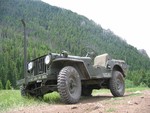 My '51 M38 up on Flathead Pass in the Bridger Mountains near my hometown Bozeman, Montana. We were the first 4x4s this year up the insane rock coulee west side some call a road!