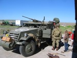 Getting ready for the Little Bighorn Days parade in Hardin MT with our friend Larry's HT. The MB broke down, so Steve & I marched the 6 miles, our kids rode in various vehicles.