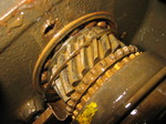 Steel retainer worn over main shaft