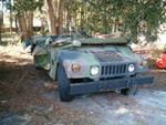 This is not what you want to happen to a Humvee. It broke loose from a low-boy on I-75 S just north of Ocala Fl and landed on it's roof.